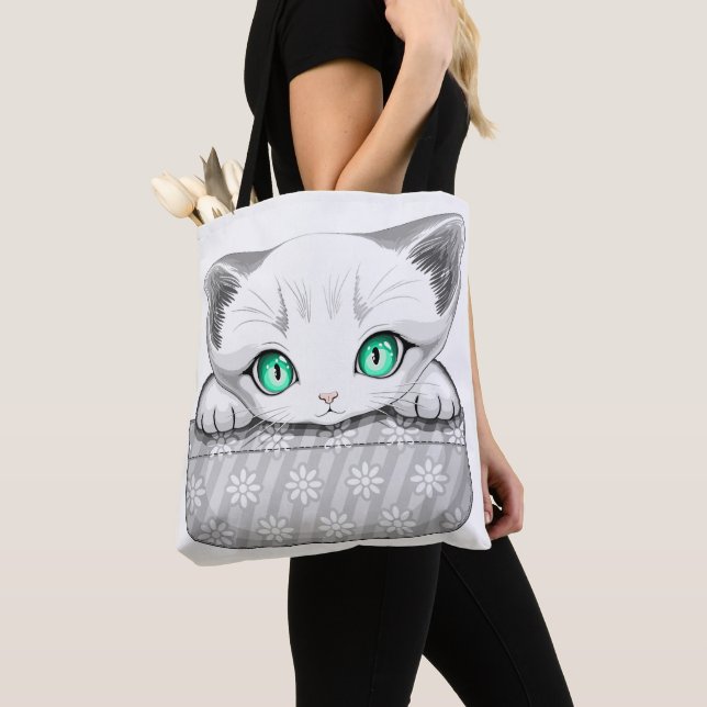 Katze Niedlich und spielerisch aus einem Pocket Tasche (Von Nahem)