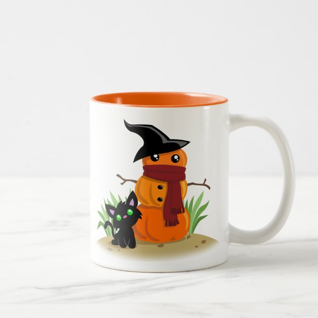 Katze und die Tasse des Pumpkinman-Kaffees (Rechts)