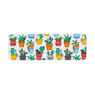 Katzen in den Blumentöpfen