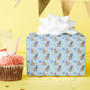 Katzen in Kiste und Milchfallen auf blau Geschenkpapier