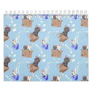 Katzen in Kiste und Milchfallen auf blau Kalender