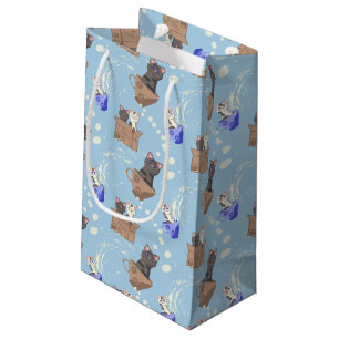 Katzen in Kiste und Milchfallen auf blau Kleine Geschenktüte