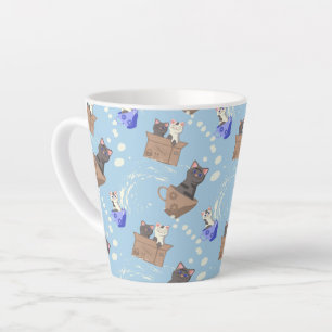 Katzen in Kiste und Milchfallen auf blau Milchtasse
