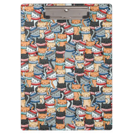 Katzen in Winterskarven und Hats-Muster Klemmbrett