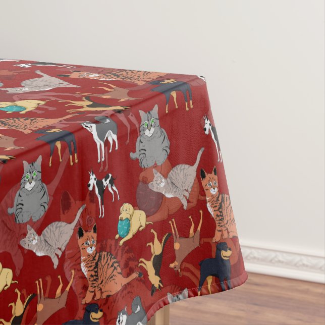 Katzen- und Hunde-Musterdesign auf Rot Tischdecke (Beispiel)