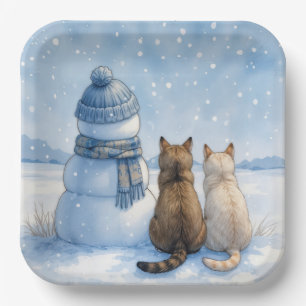 Katzensitzen mit einem Schneemann auf einem Feld Pappteller