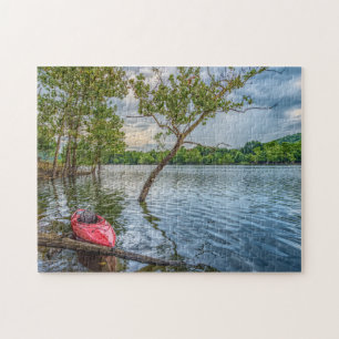 Kayak schwimmend auf Tafelfelsen Lake Jigsaw Puzzl