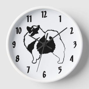 Keeshond-Grafiken - niedliche ursprüngliche Uhr