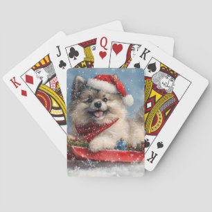 Keeshond-Hund im Schlitten Lass es schneien Weihna Spielkarten