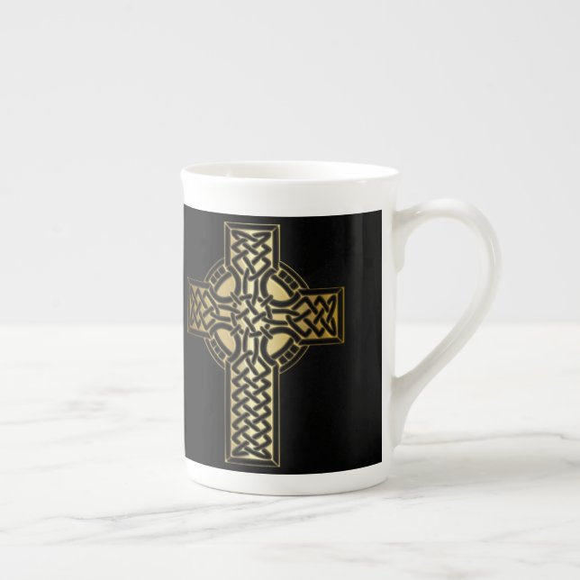 Keltisches Knoten-Kreuz im Gold und im Schwarzen Prozellantasse (Rechts)