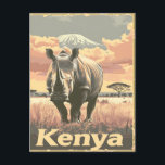 Kenya Rhino Vintag Postkarte<br><div class="desc">Tauchen Sie ein in die ungezähmte Schönheit Kenias mit unserer Reise- und Illustration. Dieses bezaubernde Stück fasziniert das Wesen einer Safari, wo majestätische Nashörner die weitläufige Landschaft mit dem ikonischen Kilimanjaro als Kulisse durchstreifen. Stellen Sie sich eine abenteuerliche Expedition vor, beobachten Sie diese unglaublichen Wesen in ihrem natürlichen Lebensraum und...</div>