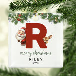 Kids Letter R Monogram Christmas Tree Ornament Aus Metall<br><div class="desc">Geben Sie Ihrem Weihnachtsbaum eine persönliche Touch in dieser Weihnachtszeit mit einem Monogramm Ornament! Mit einem Santa und einem Rentier, der hinter dem Buchstaben R herbeiguckt, kann dieser Ornament mit einem Sonderfoto, Namen und Jahr personalisiert werden, und einem beiliegenden Template Gruß. Machen Sie diesen festlichen Sake zu einem Teil Ihrer...</div>
