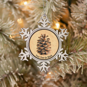 Kiefernzapfen auf altes Papier Schneeflocken Zinn-Ornament