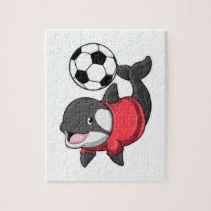 Killerwhale als Fußballspieler mit Fußball