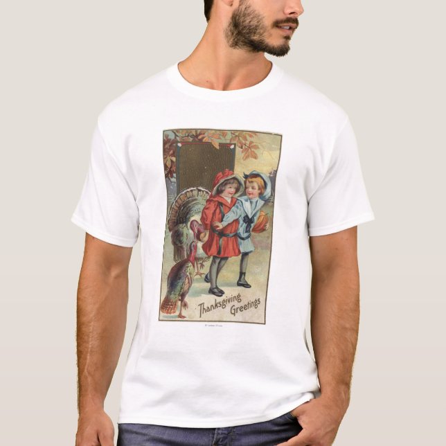 Kinder, die einen Kürbis, Truthähne halten T-Shirt (Vorderseite)