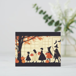 Kindertrick oder Behandlung zu Halloween Feiertagspostkarte