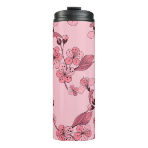 Kirschblüte in rosa Farbe auf weißem Hintergrund. Thermosbecher