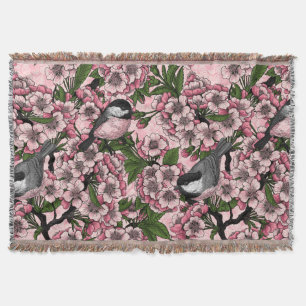Kirschblüte und Kichererbsen auf rosa Decke
