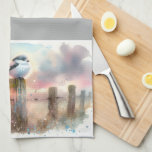 Kitchen Towels Geschirrtuch<br><div class="desc">Soft watercolor brushwork captures two fluffy songbirds resting on weathered fence posts as a glowing sunset spreads across a dreamy countryside sky. Gentle washes of peach, blush pink, pale blue, and warm gold blend into a tranquil horizon, creating a calm pastoral atmosphere. The birds appear round and feathery, their delicate...</div>