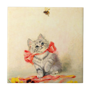 Kitten mit einem roten Band Fliese