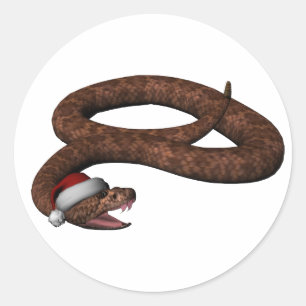 Klapperschlange mit Weihnachtsmannmütze Runder Aufkleber