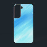 Klare blaue Wasserfarbe Kunst Samsung Galaxy Hülle<br><div class="desc">Dieses Design zeigt einen faszinierenden Verlauf von einem tiefen, reichen Blau zu einem knusprigen, transparenten Aqua. Es erinnert an das Gefühl, vom Meeresboden zur sonnenbeleuchteten Oberfläche hinauf zu schauen, oder vielleicht an die dynamische Schmelze von Wintereis und Frost. Die glatten, fließenden Linien einer Aquarelltechnik sind wunderschön kontrastiert mit zarten, feinen...</div>