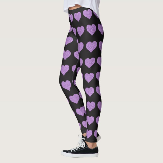Klassisch schwarze Leggings mit lila Herzmuster (Links)