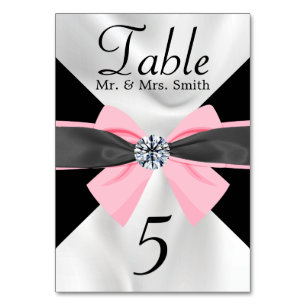 Klassische Schwarz-Weiß-Draperie mit rosa Bow Tischnummer