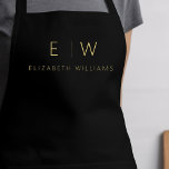 Klassischer Name der Minimalistischen Schwarz-Gold Schürze<br><div class="desc">Erleben Sie kulinarische Erlebnisse mit unserer klassischen Elegant Moderne Minimalistische Monogram Name Cooking Schürze. Diese Küche ist unverzichtbar und vereint zeitlose Eleganz mit zeitgemäßem Minimalismus. Diese Schürze ist nicht nur ein praktisches Accessoire, sondern auch eine persönliche Note. Mit der individuell anpassbaren Monogramm- und Namensoption können Sie Ihre Persönlichkeit in Ihre...</div>
