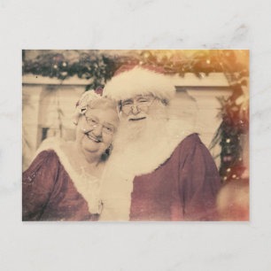 Klassischer Weihnachtsmann und Frau Claus Feiertagspostkarte