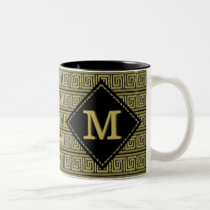 Klassisches griechisches Schlüsseldesign in Gold u Zweifarbige Tasse