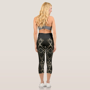 Klassisches Retro-Design in Schwarz und Gold Capri Leggings