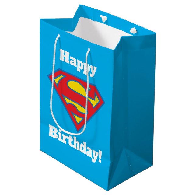 Klassisches Supergirl-Logo mit blauer Kontur Mittlere Geschenktüte (Vorderseite Schrägansicht)