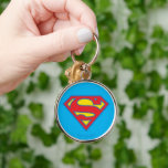 Klassisches Supergirl-Logo mit blauer Kontur Schlüsselanhänger<br><div class="desc">Supergirl | Karo aus diesem klassischen Supergirl S-Schild in rot und gelb,  in blau umrissen!</div>