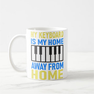 Klavier und Keyboards spielen Kaffeetasse