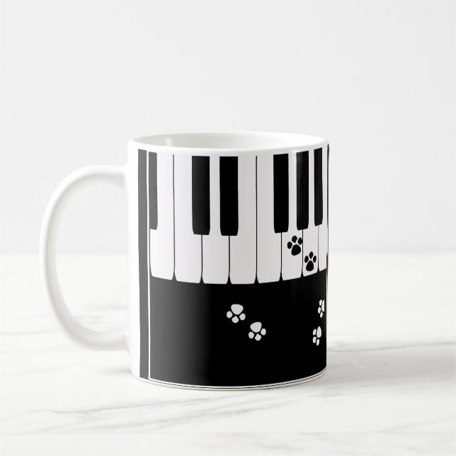 Klaviertasten und Katzenfußpfoten Kaffeetasse (Links)
