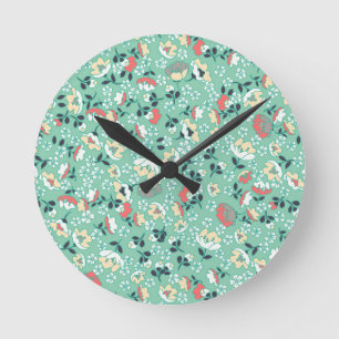 Kleine Blume (grün) Runde Wanduhr