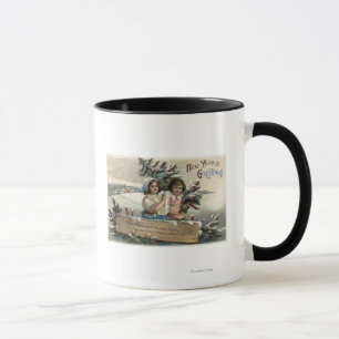 Kleine Mädchen, die ein Geschenk und einen Baum ha Tasse