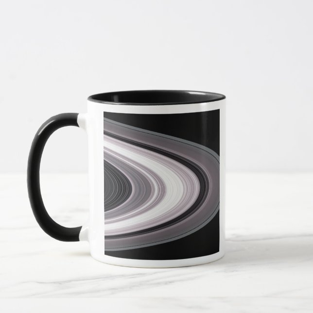 Kleine Partikel in SaturnÃ, aber Â Â ½s Rings Tasse (Links)