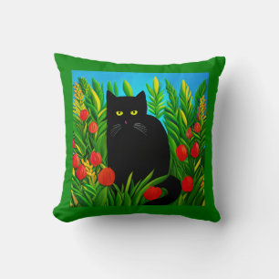 Kleine schwarze Katze in einem Tulip-Garten Kissen