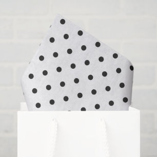 Kleine schwarze Punkte auf weißer Geschenkverpacku Seidenpapier