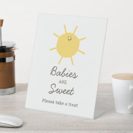 Kleine Sonnenscheinbabys sind süße Leckerei-Zeiche Sockelschild