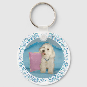 Kleiner Havanese auf türkisfarbenem Sofa Schlüsselanhänger