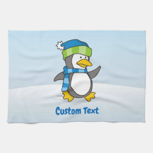 Kleiner Pinguin auf Schneeküche Handtuch