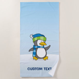 Kleiner Pinguin, der auf Schnee geht Strandtuch