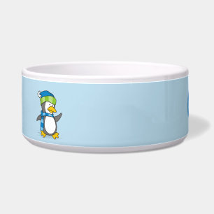 Kleiner Pinguin, der auf Schneeschuhe geht Napf