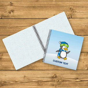 Kleiner Pinguin läuft auf Schnee Notizbuch