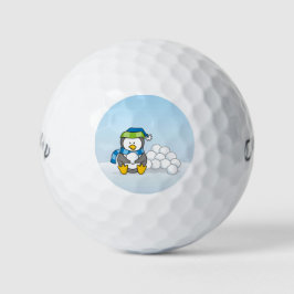 Kleiner Pinguin mit Schneebällen Golfball