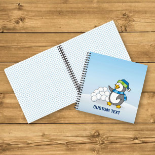 Kleiner Pinguin mit schneebedeckten Kugeln Notizbuch