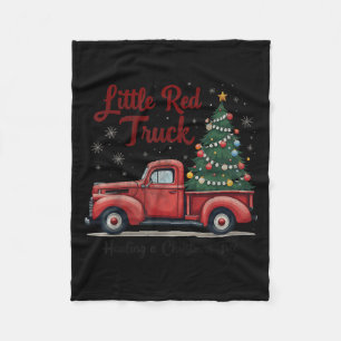 Kleiner roter LKW, der einen Weihnachtsbaum Famili Fleecedecke